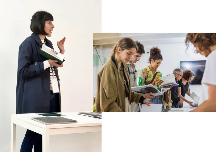 Mireia Alises, comisaria de la exposición de fotolibros "Fotolibros e identidad: ventanas a la diversidad cultural y social durante la visita guiada en el Festival Revela't 2024.